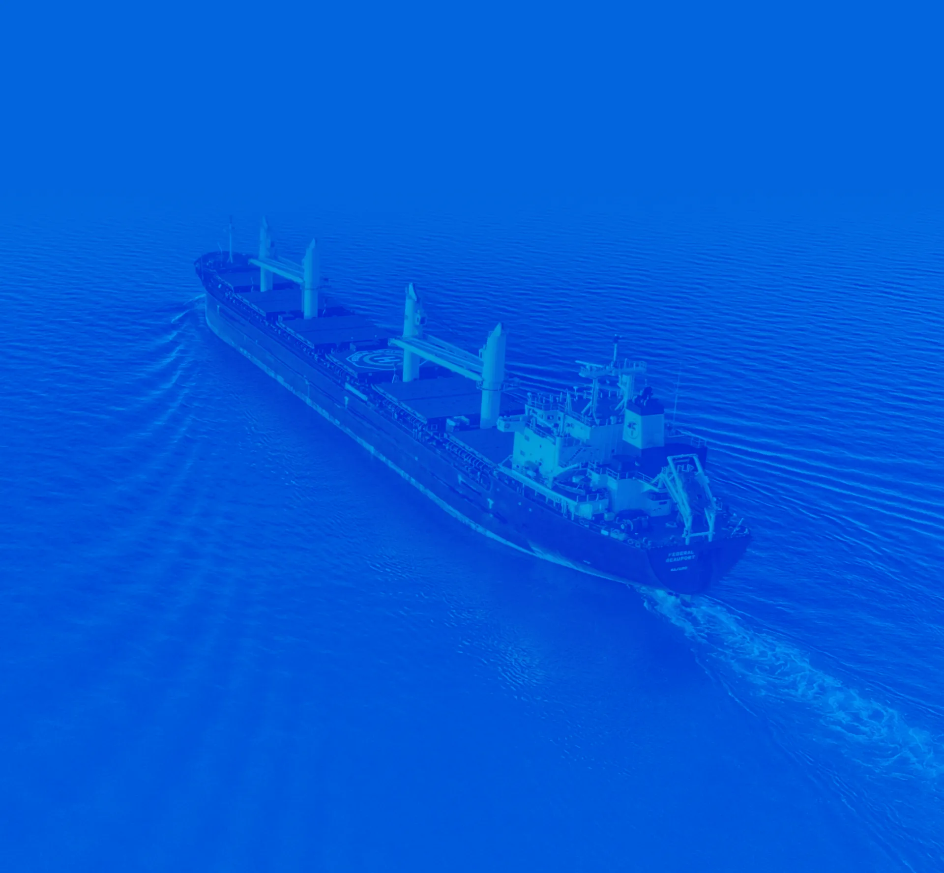 a large blue ship in the ocean