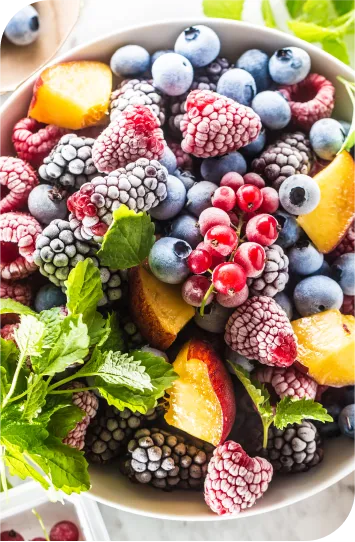 a bowl of colorful fruit